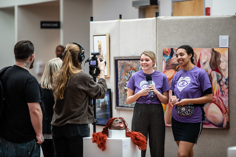 Artists discuss their work on display at National Day of Racial Healing.