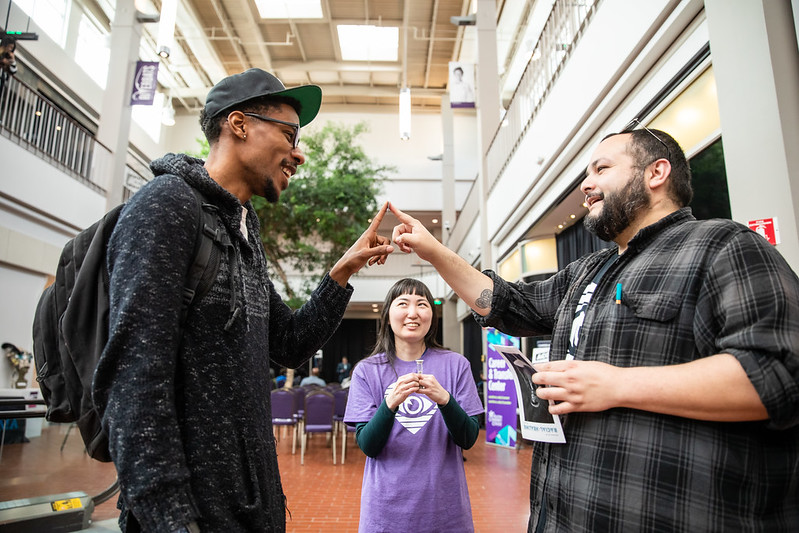 National Day of Racial Healing participants give positive affirmations to each other during exercise.