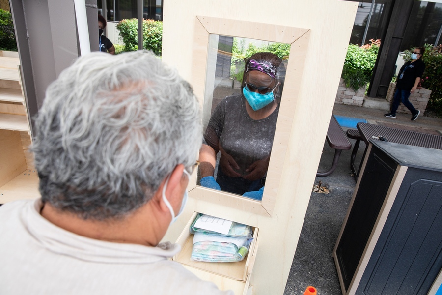 ACC Facilities support teams built specialized booths and carts to help with social distancing