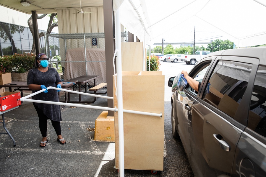 ACC Facilities support teams built specialized booths and carts to help with social distancing