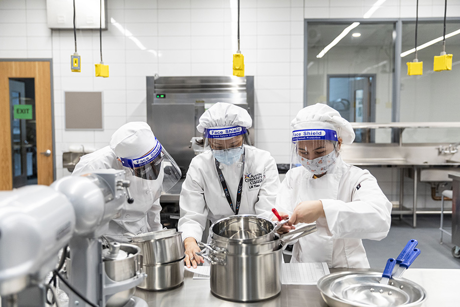 Students are introduced to professional kitchen utensils and pots during a Basic Food Prep class on the first day of spring 2021 semester inside the Demonstration Kitchen at the Highland Campus, Building 2000.