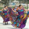 folklorico dancers performing at ACC Diez y Seis celebration